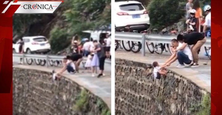 Difunden video de hombre sujetando a niño en acantilado para obtener una selfie
