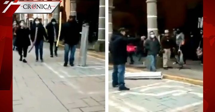 Hombre lanza lámina a joven por no usar cubrebocas en Puebla (VIDEO)