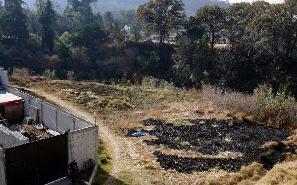 Cadáver calcinado es localizado en Flor del Bosque