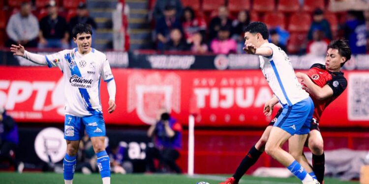 Puebla rescata empate ante Xolos